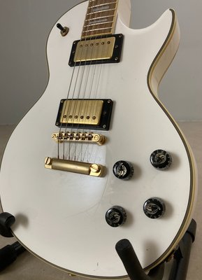 Supreme Rage hvid single cut elguitar med guld hardware