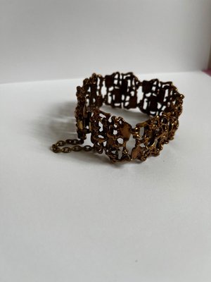Pentti Sarpaneva skulpturelt finsk ambånd i bronze.